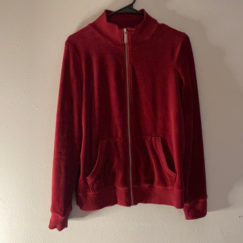 Red Michael Kors zip-up jacket. Good condition. Velour.